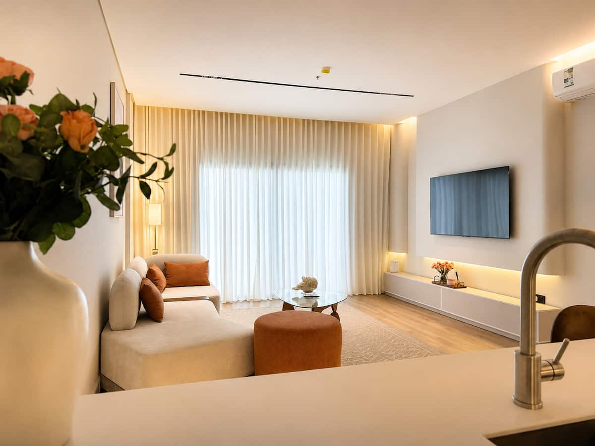 Warm living room in Rihab's luxury lake view apartment