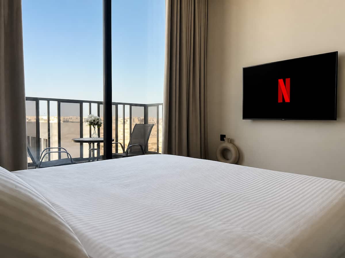 Rihab studio bedroom with a private balcony and smart TV